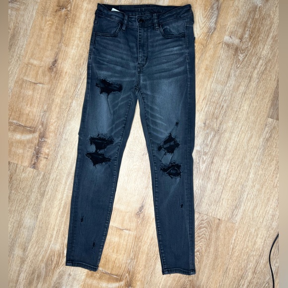 American Eagle Outfitters Denim - Distressed Black Skinny Jeans AMERICAN EAGLE next level stretch jegging. Size 6.